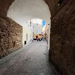 En El Centro Bajo A *