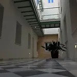 En El Centro Bajo A *